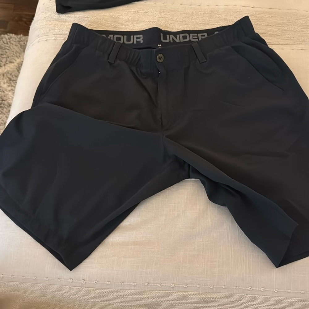 Under Armour Golf Shorts Black Mens size 38.  See pictures for dimensions.
